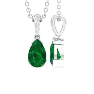 3/4 CT Pear Cut Emerald Solitaire Pendant in Half Bezel Setting with Diamond Accent Bail