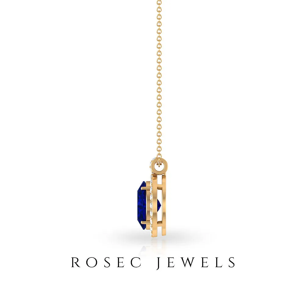 Created Blue Sapphire Oval Halo Pendant with Diamond