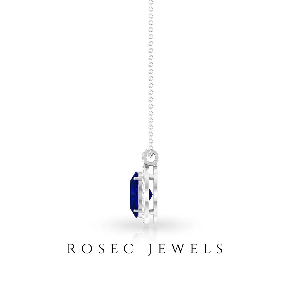 Created Blue Sapphire Oval Halo Pendant with Diamond