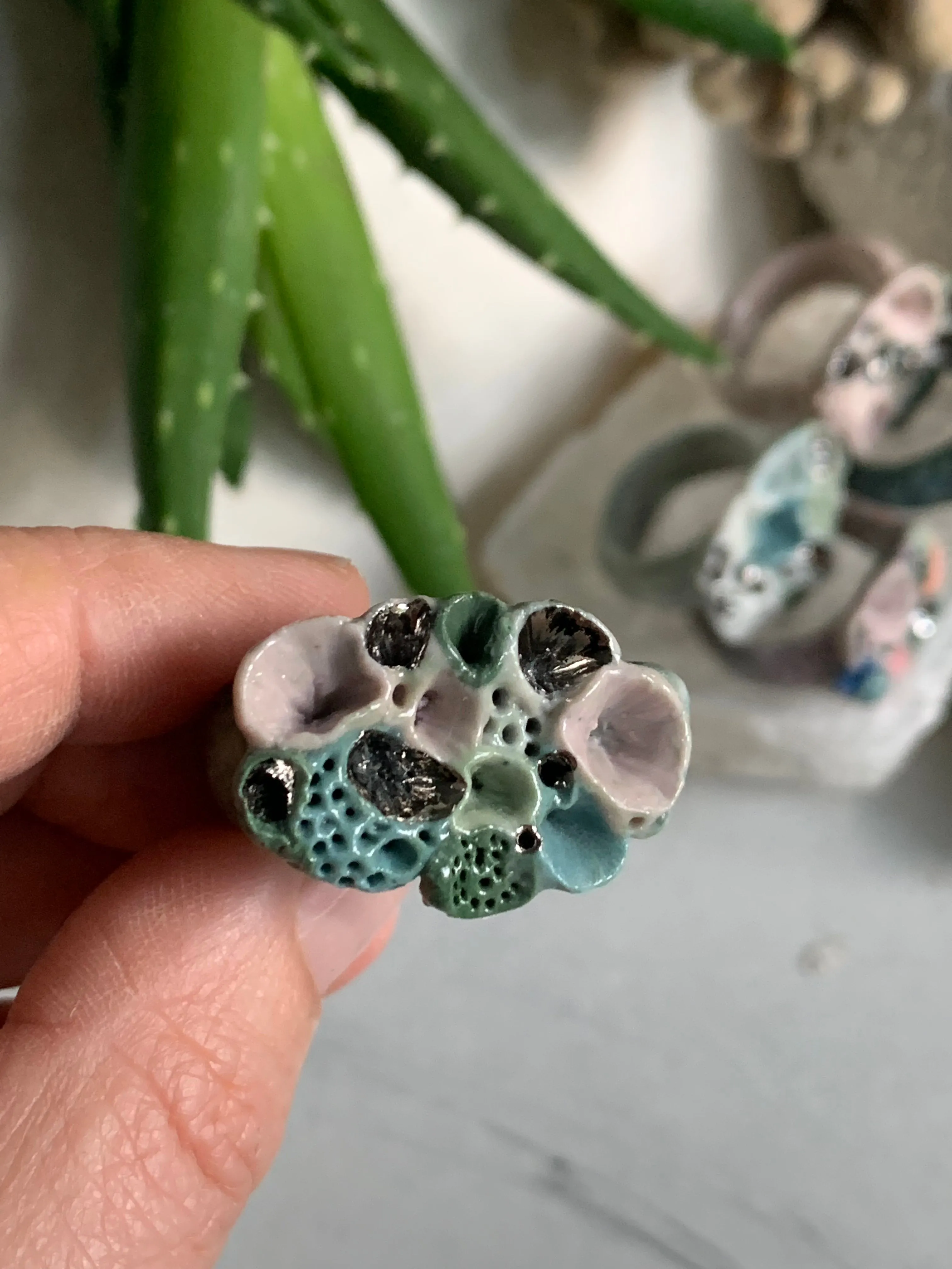 Green tones porcelain ‘rock coral’ ring with platinum detail- larger sizes. choose a size