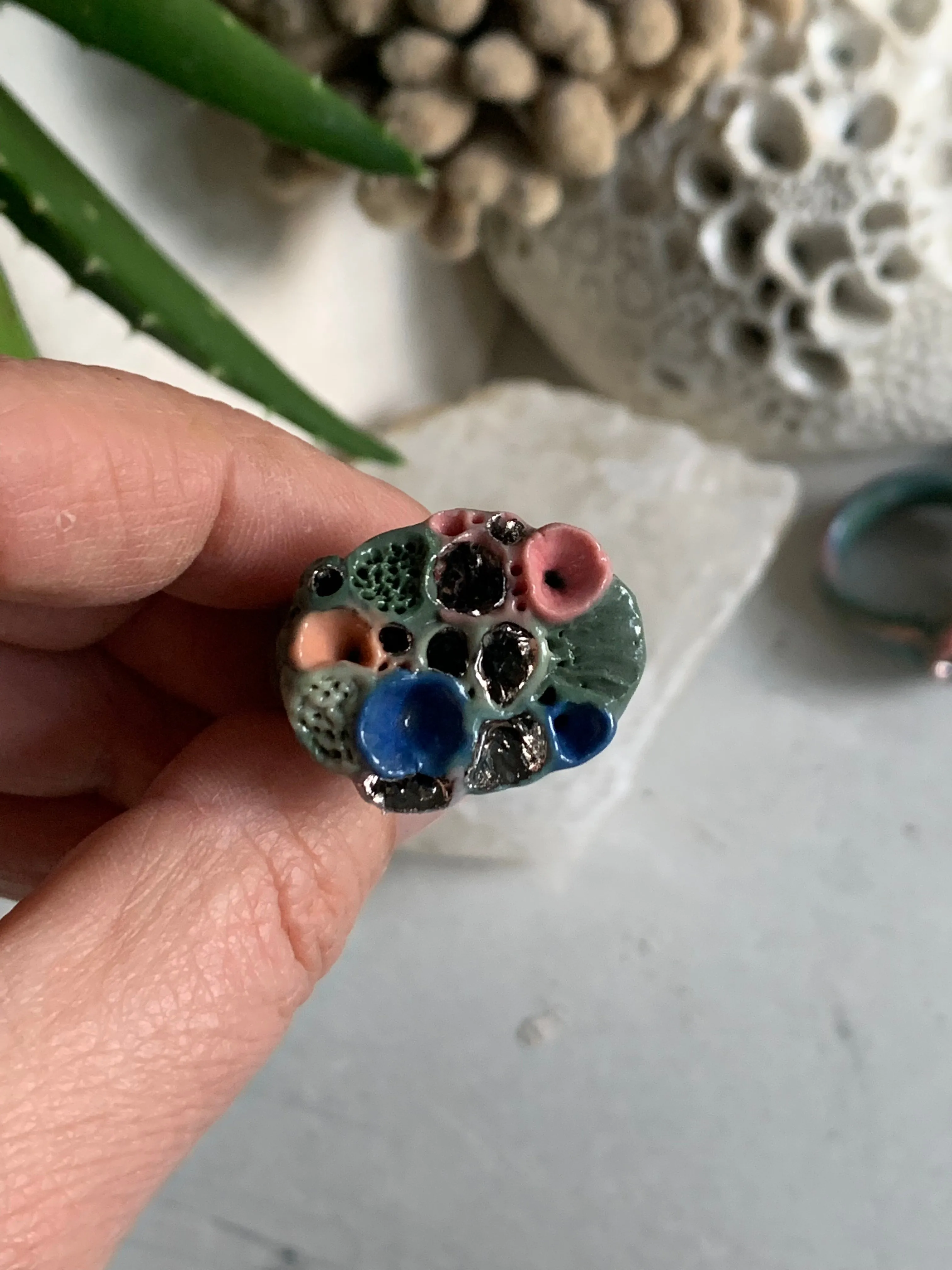 Green tones porcelain ‘rock coral’ ring with platinum detail- larger sizes. choose a size