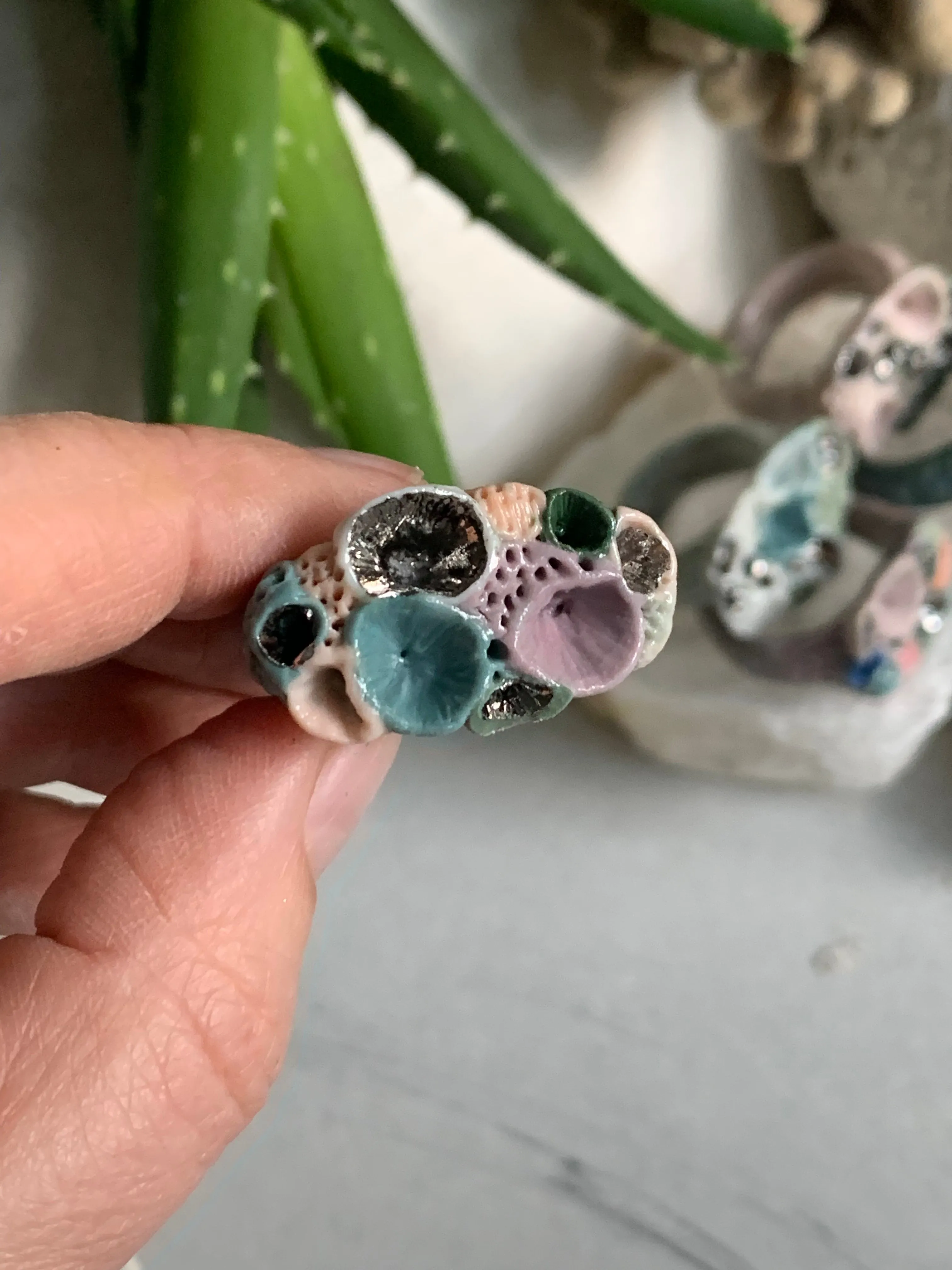 Green tones porcelain ‘rock coral’ ring with platinum detail- larger sizes. choose a size