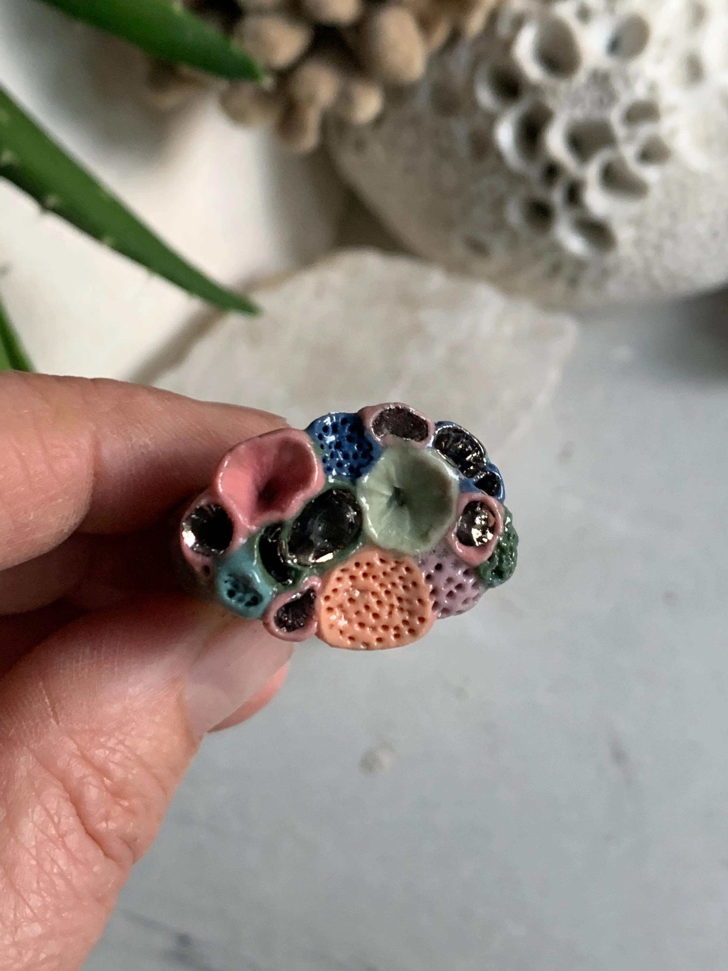 Green tones porcelain ‘rock coral’ ring with platinum detail- larger sizes. choose a size