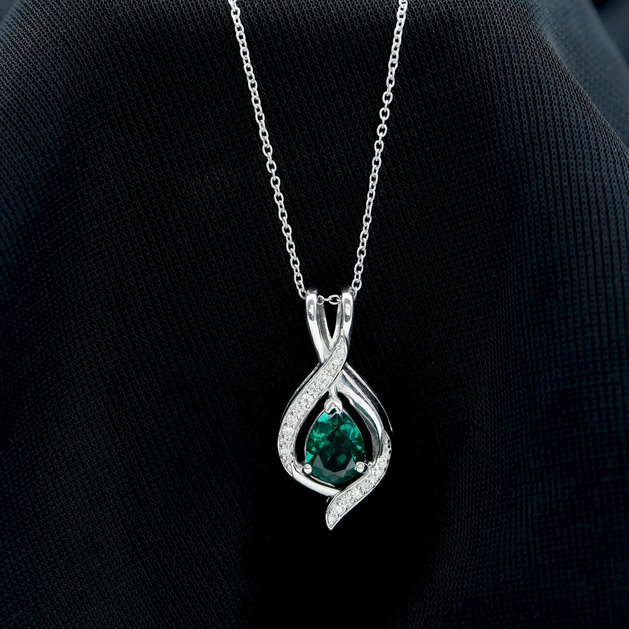 Pear Cut Created Emerald Teardrop Pendant with Moissanite Accent