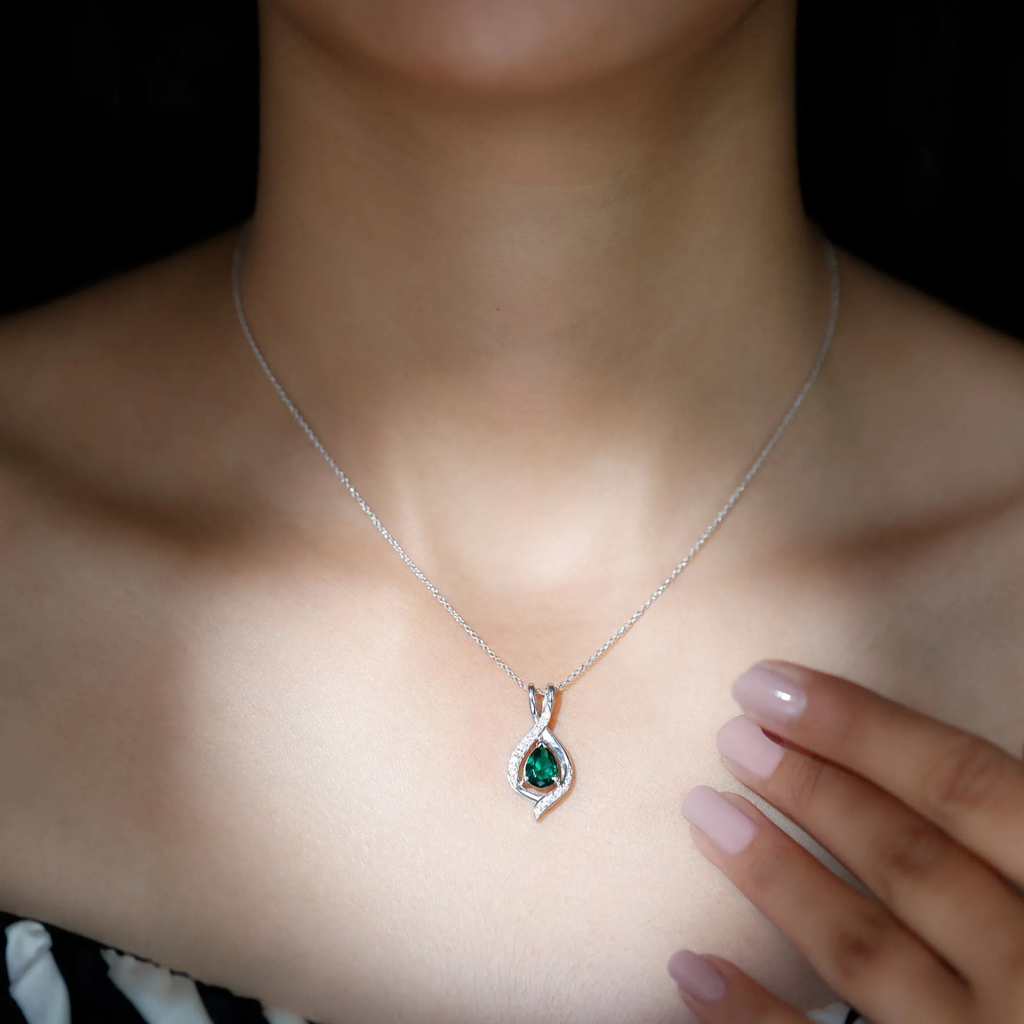 Pear Cut Created Emerald Teardrop Pendant with Moissanite Accent