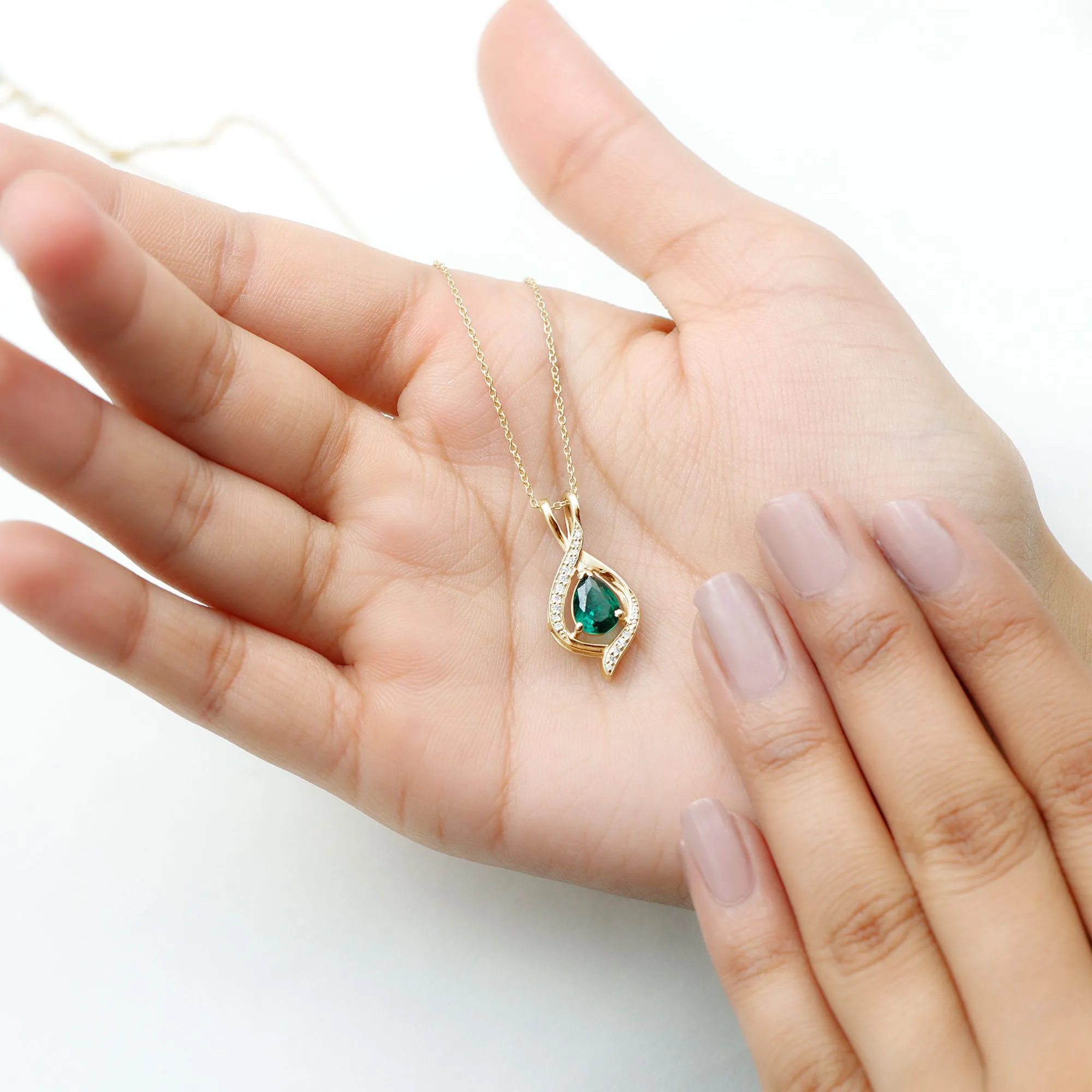 Pear Cut Created Emerald Teardrop Pendant with Moissanite Accent