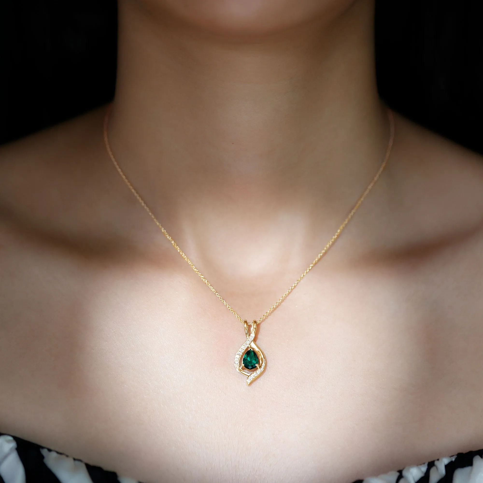 Pear Cut Created Emerald Teardrop Pendant with Moissanite Accent